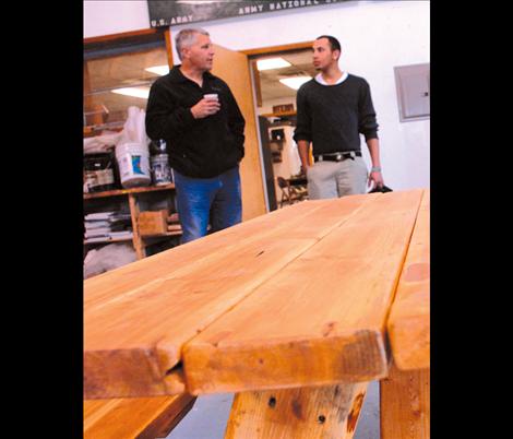 Tom Clemens, left, visits with student Daniel Hinderliter, Colorado Springs. In the maintenance program, Hinderliter particularly enjoys getting to build items, such as picnic tables, and landscaping. The skills he learns could be used as an apartment manager or he could get into plumbing. 