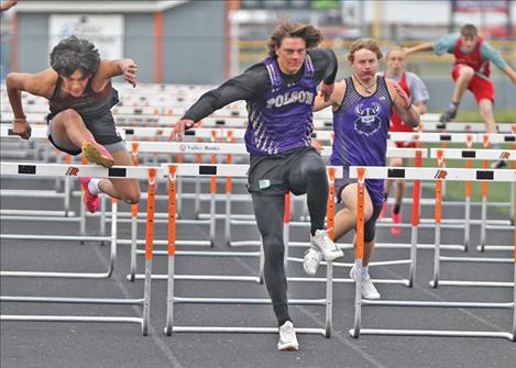 Polson Pirate Ashtyn Nelson wins 100 meter hurdles race with close competition.