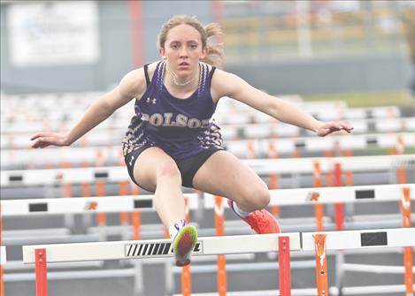 Polson Lady Pirate Ross Bishop wins the  varsity 100 meter hurdles event for the May 2, Lake County Track Meet.