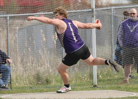 Polson Pirate Astin Brown heaves the discus and wins first place. 