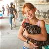 Reagan Reash hugs her hen “Speckles.”