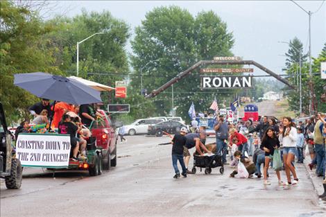 summer goddard / valley journal An all-out water fight broke out as the Second Chance float rolled past the Second Chance Saloon during the Pioneer Days parade on Aug. 4.