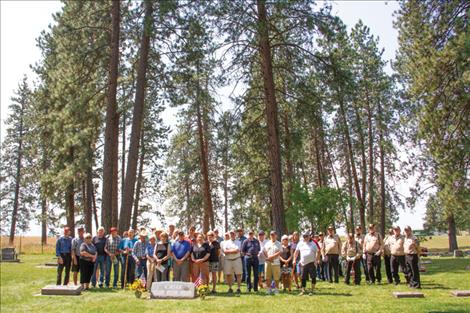 Participants in an Aug. 10 memorial tribute for Phillip McVey, who lost his life fighting the Mann Gulch in 1949, pose for a photo.