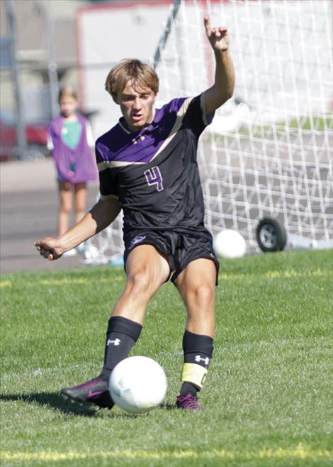 Polson Pirate soccer player Ruger Ellis strikes the ball in a game in an Aug. 31 game against Park County.