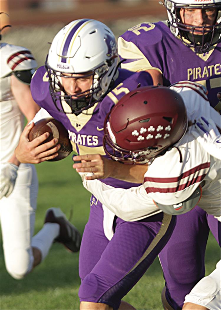 Pirates prevail under Friday night lights