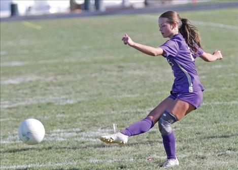 Polson Lady Pirate soccer player Ciri Nice kicks the ball during a game against the Stevensville Yellow Jackets.