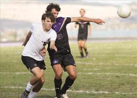 Polson soccer player Cruz Lies maneuvers to get to the ball before his opponent during an Oct. 5 game against the Stevensville Yellow Jackets.