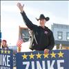 Ryan Zinke, Republican candidate for Montana’s Western District seat in the U.S. House of Representatives, waves to motorists in downtown Polson last Friday.