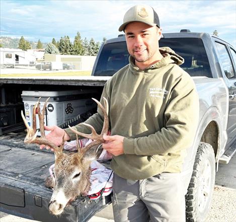 Norman Parent of Kalispell with his harvested deer. 