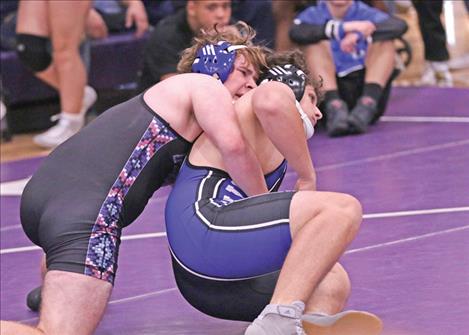 St. Ignatius-Charlo wrestler Jack Keast, right, maneuvers in front of his opponent during the Dec. 6 Owen Invitational Wrestling Tournament.