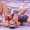 Avari Stone pins her opponent in the 105 weight category. More photos on page 17.