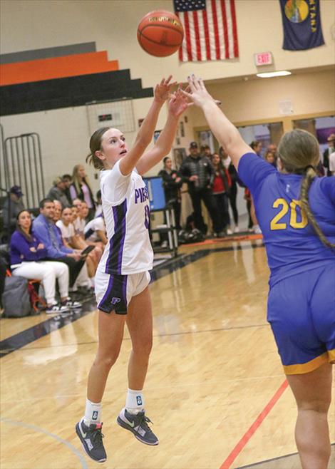 Polson Lady Pirate Hinkley Moss shoots a two-pointer