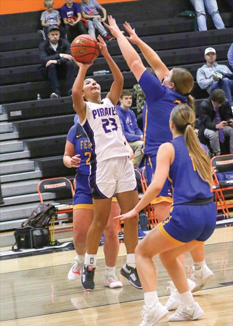 Lady Pirate Olivia Ramirez makes a jump shot.