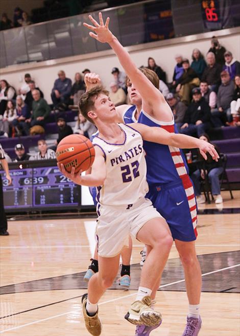 Polson Pirate Maddox Bird attempts a two-pointer during a Jan. 21 game against the Bigfork Vikings.