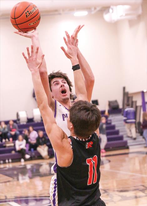 Cason Graham rises for a two-pointer during a Feb. 22 game against the Ronan Chiefs.