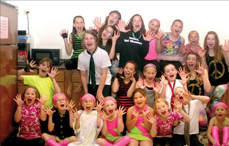 The Downtown Dance Collective dancers in Arlee pose before performing their tribute  performance to The Beatles.