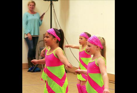 Piper Clinkenbeard, Alyce Corcoran, Maddie Dunlop and Natalie Yokum perform to The Beatles’ song, “She’s So Heavy.”