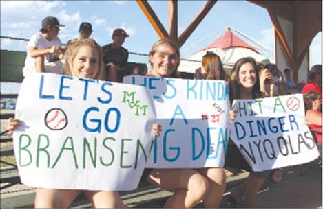 Dakota Worrall, Hailey Coe and Rachel Worrall show some support for their favorite Mariners. 