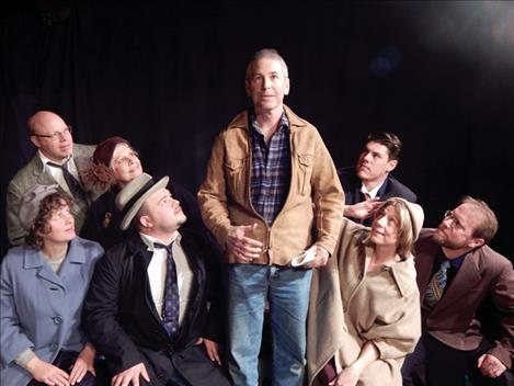 John Doe, center, portrayed by David King, is joined by 25 Mission Valley actors, including from left, Gary Collinge, Kyle Geyer, Cindy Sorenson, Jacob Kimmel, Jake Durglo, Jeanie and Jim Siragusa in a setting resembling Norman Rockwell’s painting titled “Freedom of Speech.” 