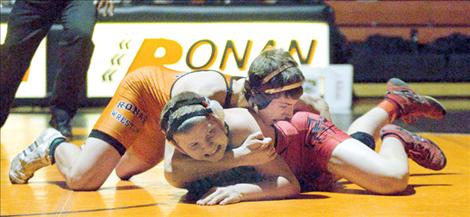 Connor Benn, 140 pounds, gets a hold on Noxon’s Luke Crowe. Benn won by pin in 35 seconds.