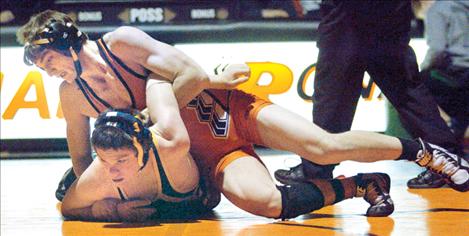 Kyle Lawson tangles with Tristan Huff of Deer Lodge last Thursday. Lawson won by pin in 46 seconds, going on to defeat Noxon’s Cory Neil by pin in 1:28. 