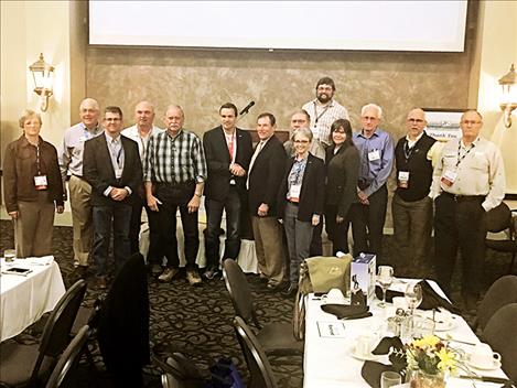 Greg Lukasik is photographed at an awards ceremony announcing his selection as the American Water Works Association Fuller Award winner.