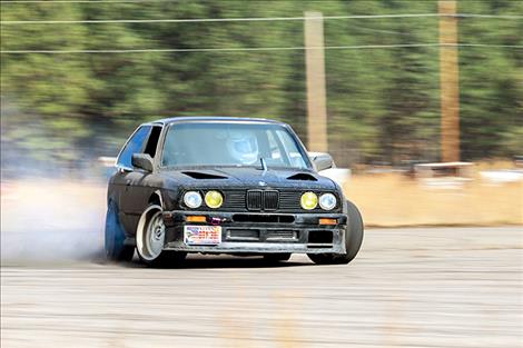 Drift racing drivers intentionally over-steer through corners to lose traction in the rear wheels, then correct to maintain control.