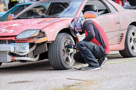 A drift driver makes a pit stop.